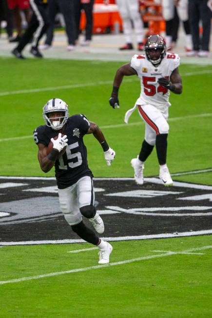 Las Vegas Raiders wide receiver Nelson Agholor (15) runs after making a catch as Tampa Bay Bucc ...