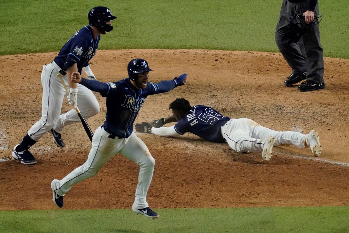Tampa Bay Rays' Randy Arozarena celebrates after scoring the winning run in Game 4 of the World ...