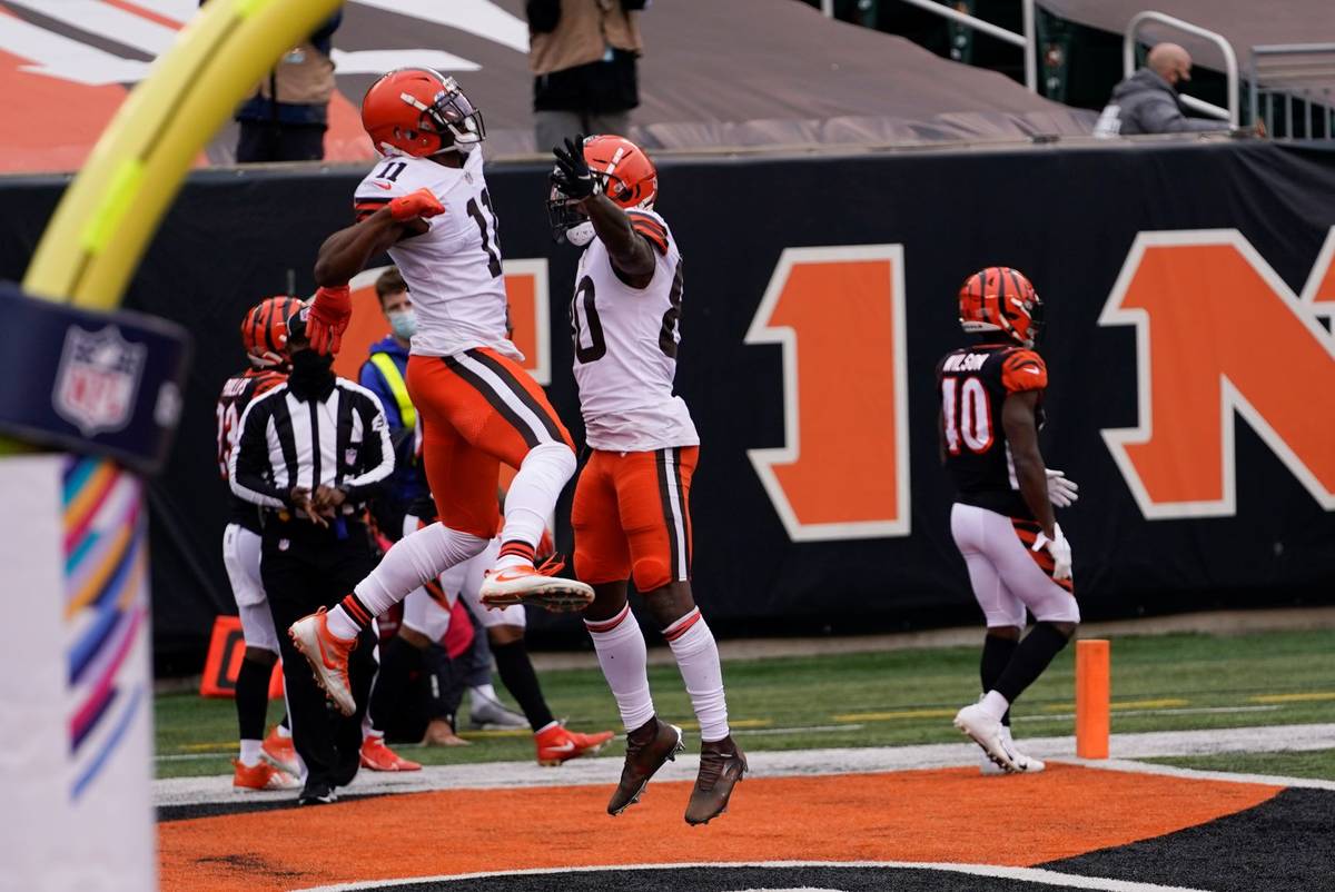Cleveland Browns' Donovan Peoples-Jones (11) celebrates his touchdown reception with Jarvis Lan ...