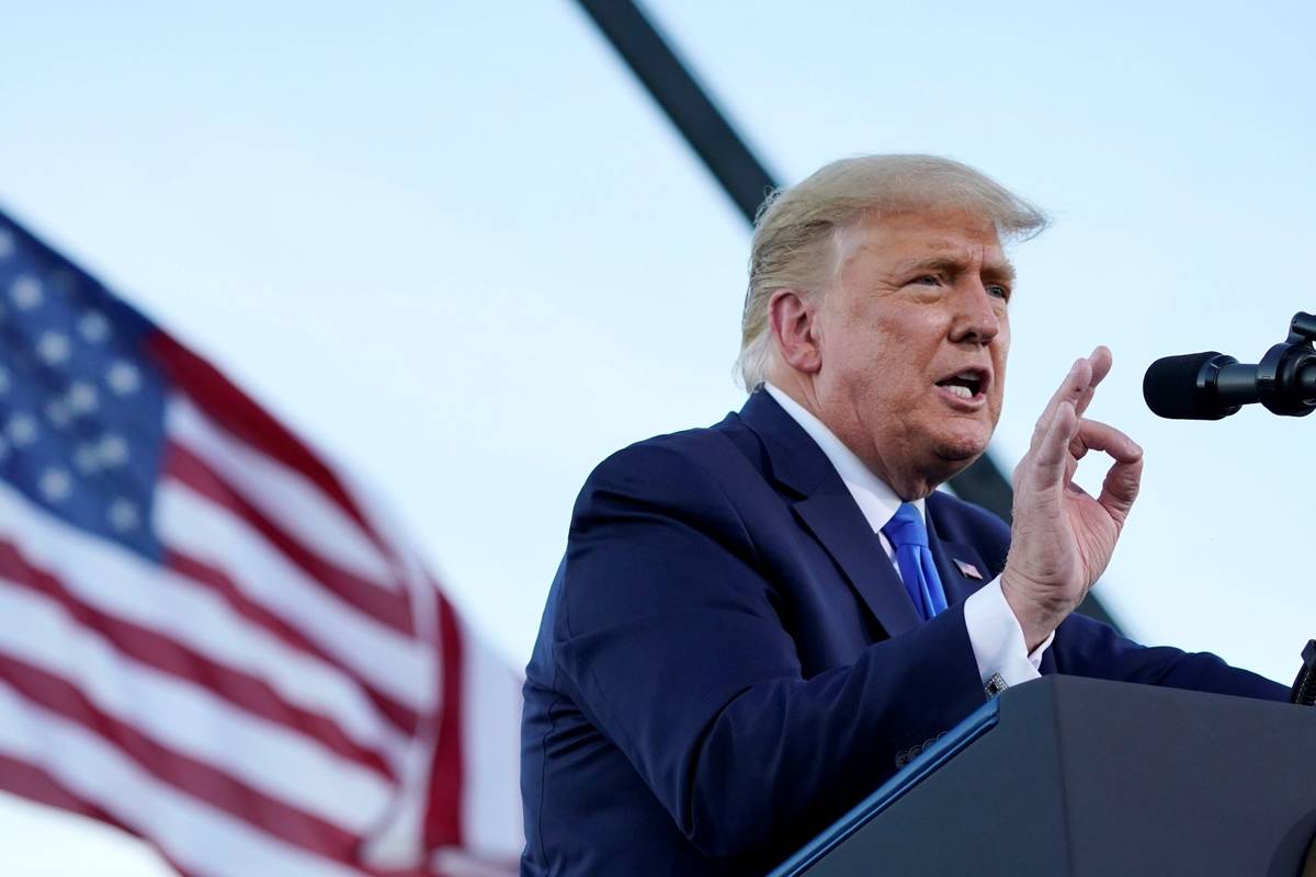 President Donald Trump speaks at a campaign rally at Carson City Airport, Sunday, Oct. 18, 2020 ...