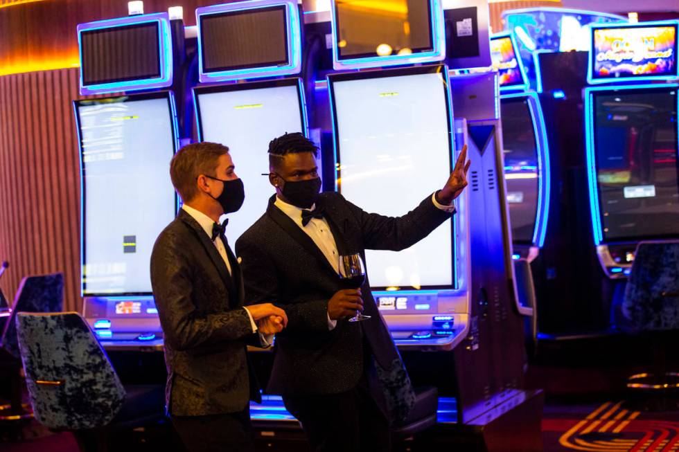 Invited guests explore Circa during the VIP black-tie grand opening event in downtown Las Vegas ...