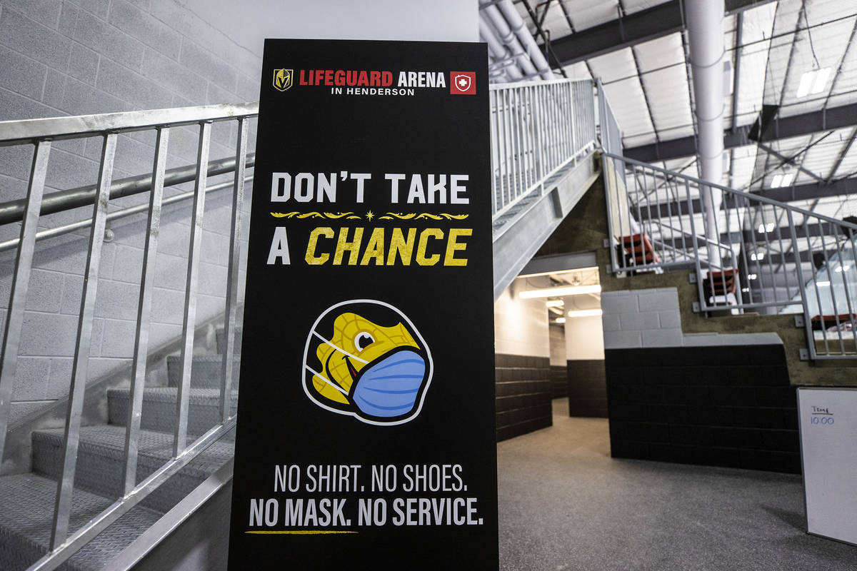 Signage promoting COVID-19 safety protocols at the Golden Knights' Lifeguard Arena on Monday, O ...