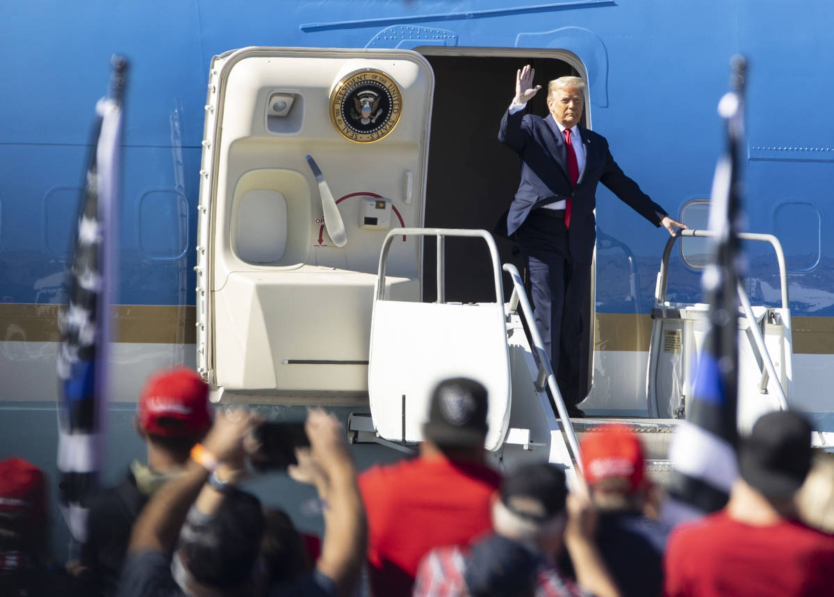 President Donald Trump arrives on Air Force One at Laughlin/Bullhead International Airport to a ...
