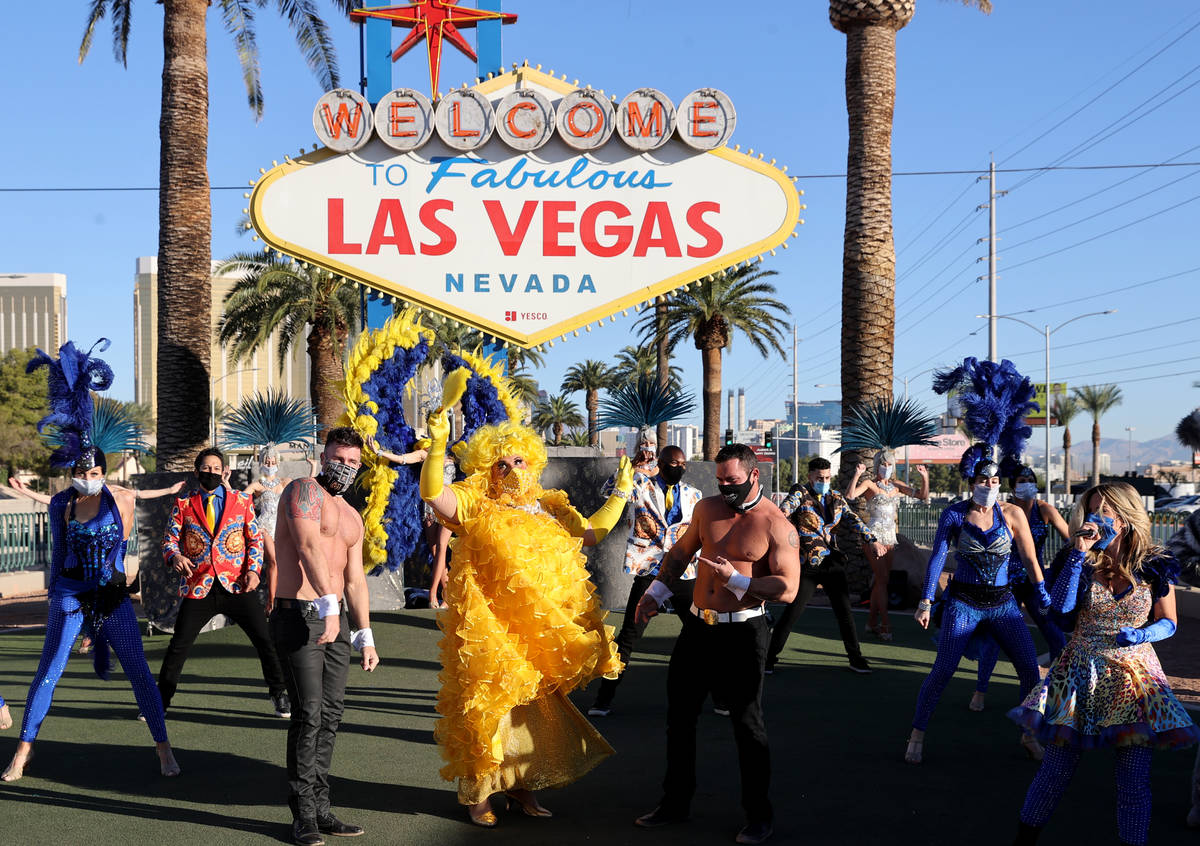 Las Vegas performers, including Jim "Auntie Norma Llyaman" McCoy, front, people kick off a mult ...