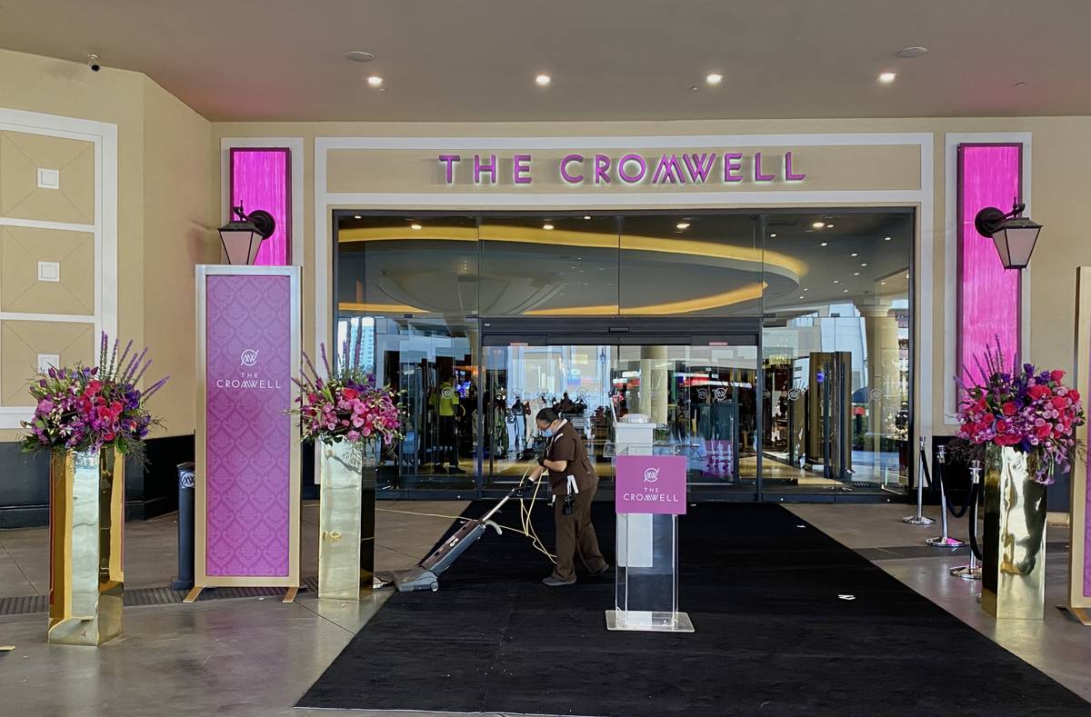 The carpet is vacuumed outside The Cromwell before a reopening ceremony on Thursday, Oct. 29, 2 ...