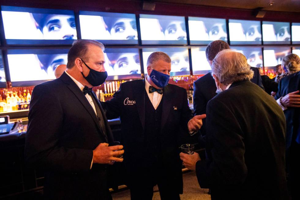 Circa owner Derek Stevens, center, mingles with friends and guests during the VIP black-tie gra ...
