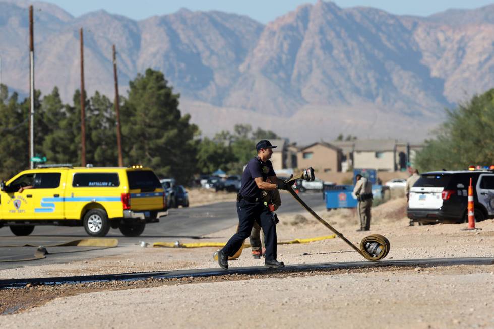 The scene of an airplane crash near the intersection of Pebble Road and South Valley View Boule ...