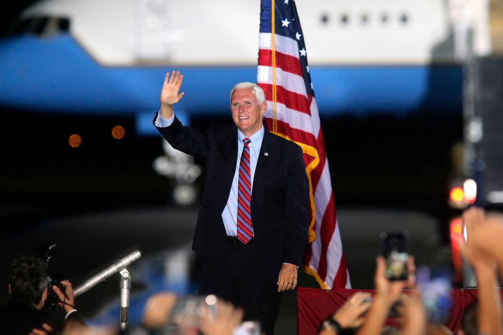 Vice President Mike Pence waves to supporters Saturday Oct. 24, 2020 in Tallahassee, Fla. Battl ...