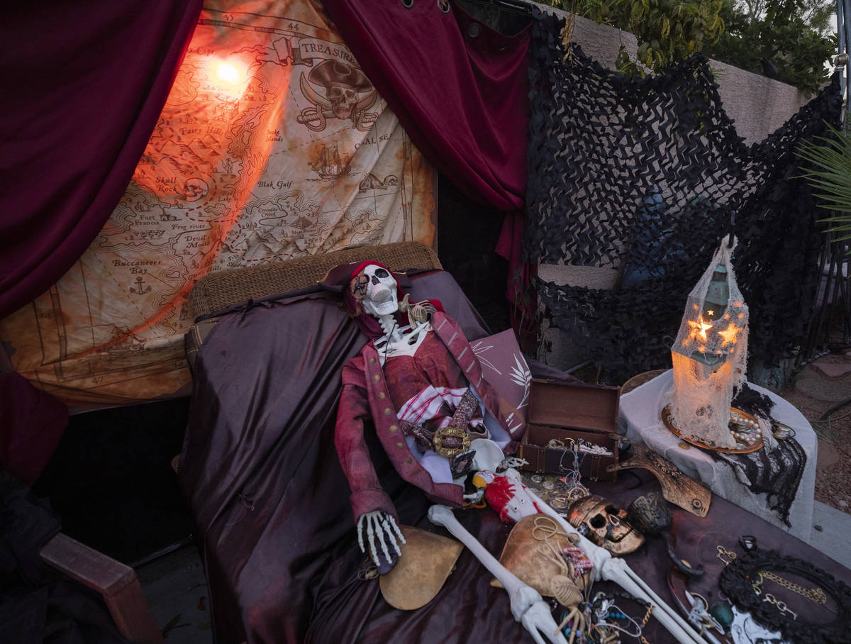 A skeleton scene from The Pirates of the Caribbean is seen in the GarciaÕs backyard for th ...