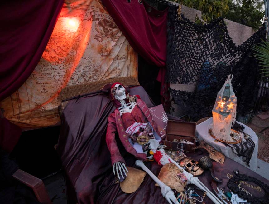 A skeleton scene from The Pirates of the Caribbean is seen in the GarciaÕs backyard for th ...