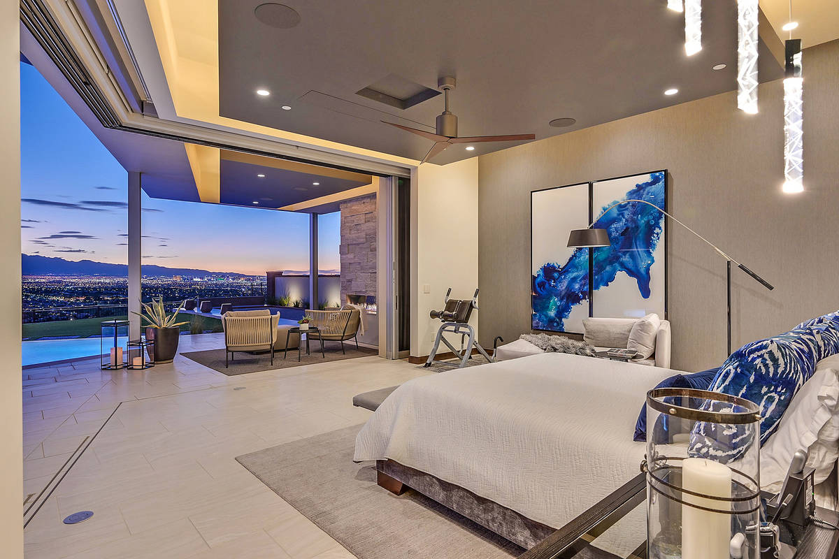 The master bedroom has a "disappearing corner" that connects the room to the pool and spa area. ...