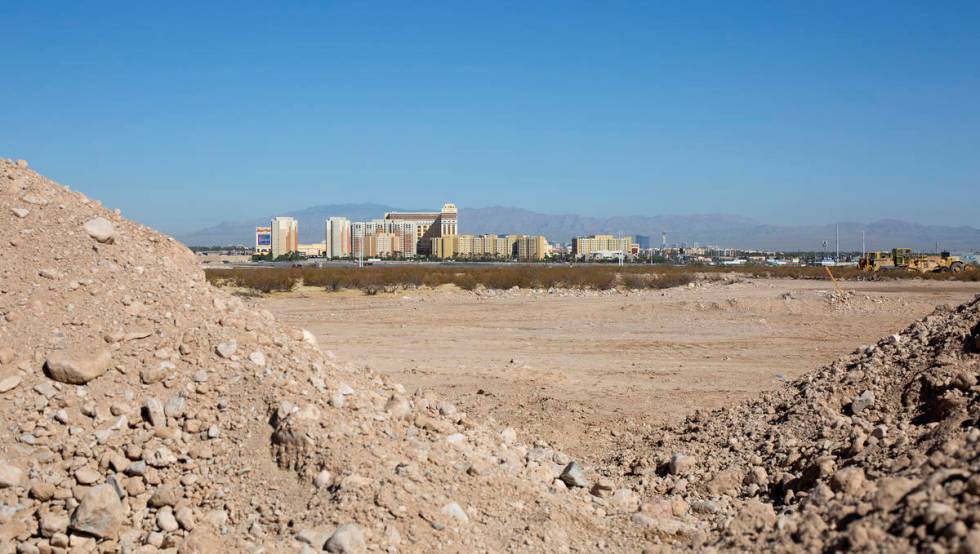 The Las Vegas Strip is in the background of the construction site of new apartment complex Ariv ...