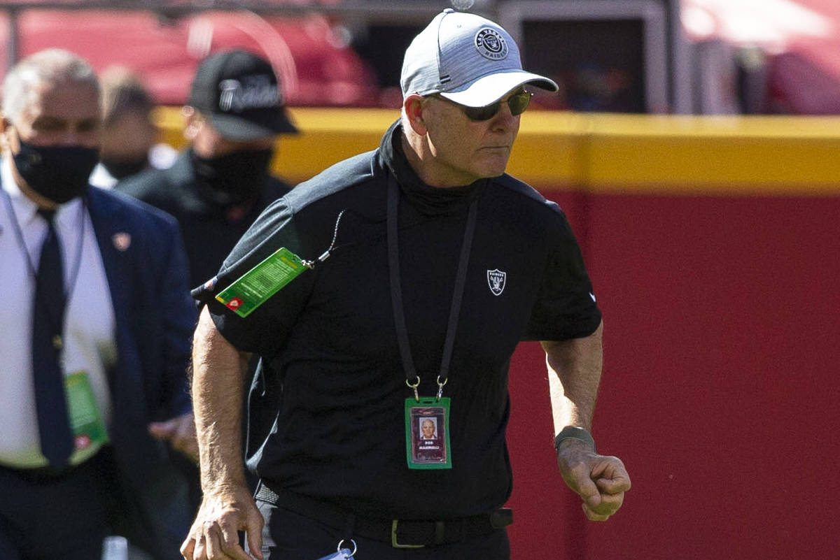 Las Vegas Raiders defensive line coach Rod Marinelli runs on the field before an NFL football g ...