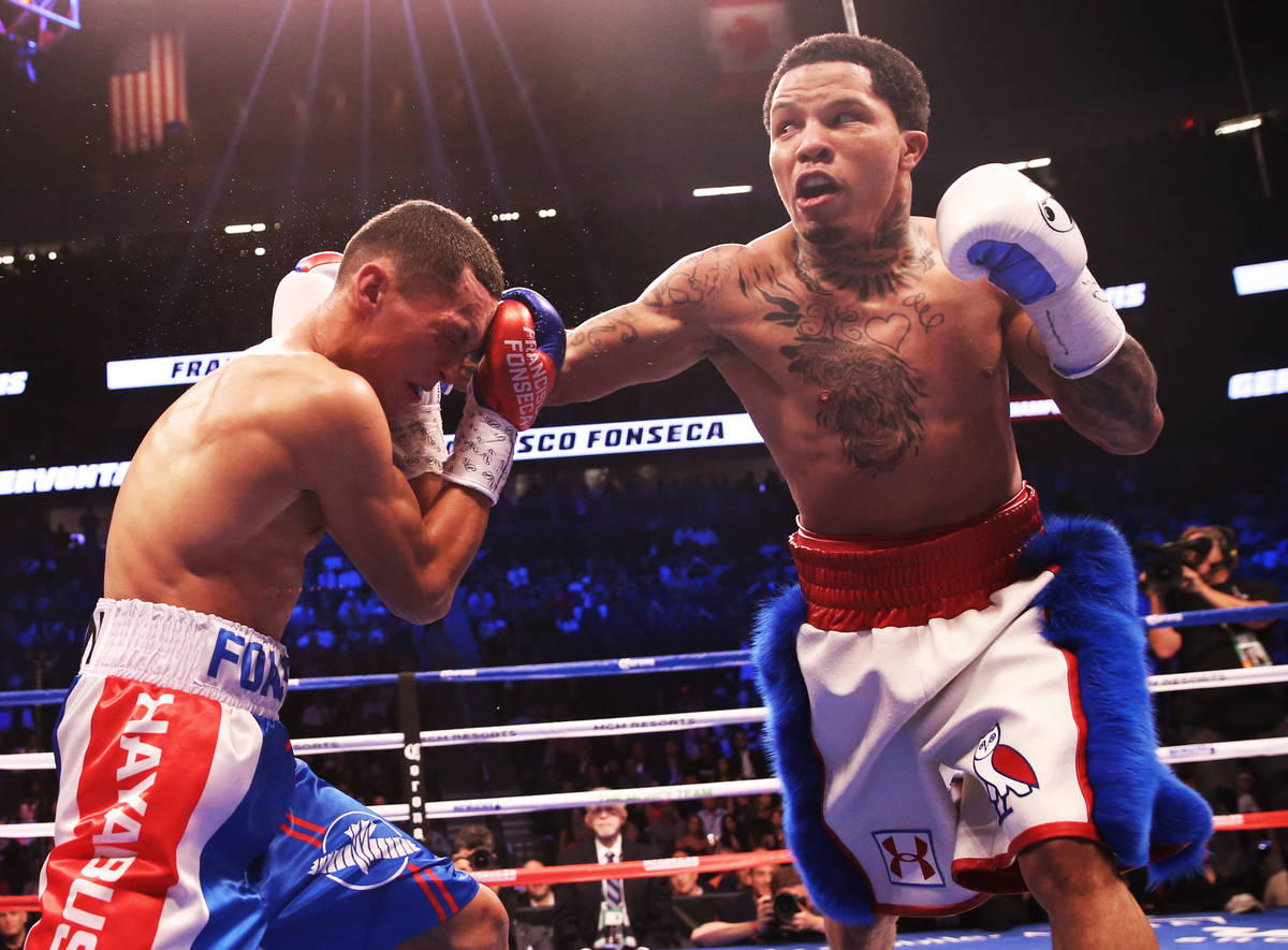 Gervonta Davis, right, throws a punch against Francisco Fonseca in the 6th round on Saturday, A ...