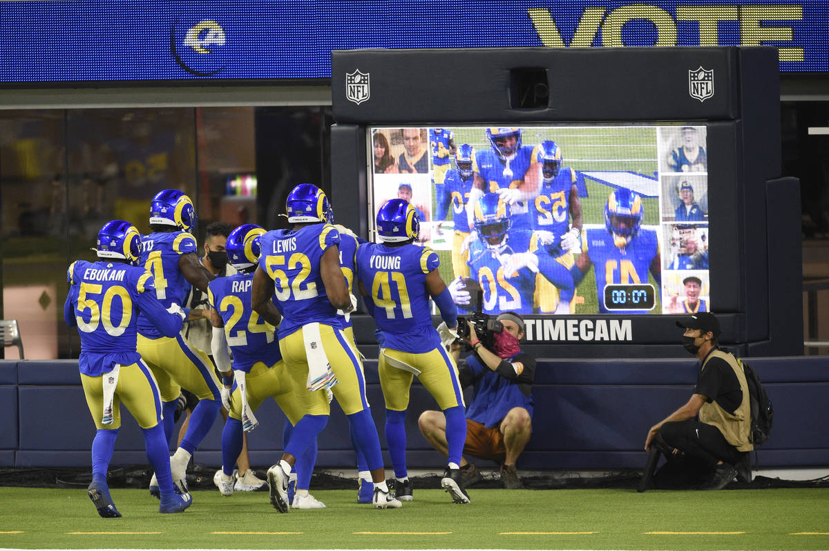 Los Angeles Rams players celebrate after an interception by Jalen Ramsey during the second half ...