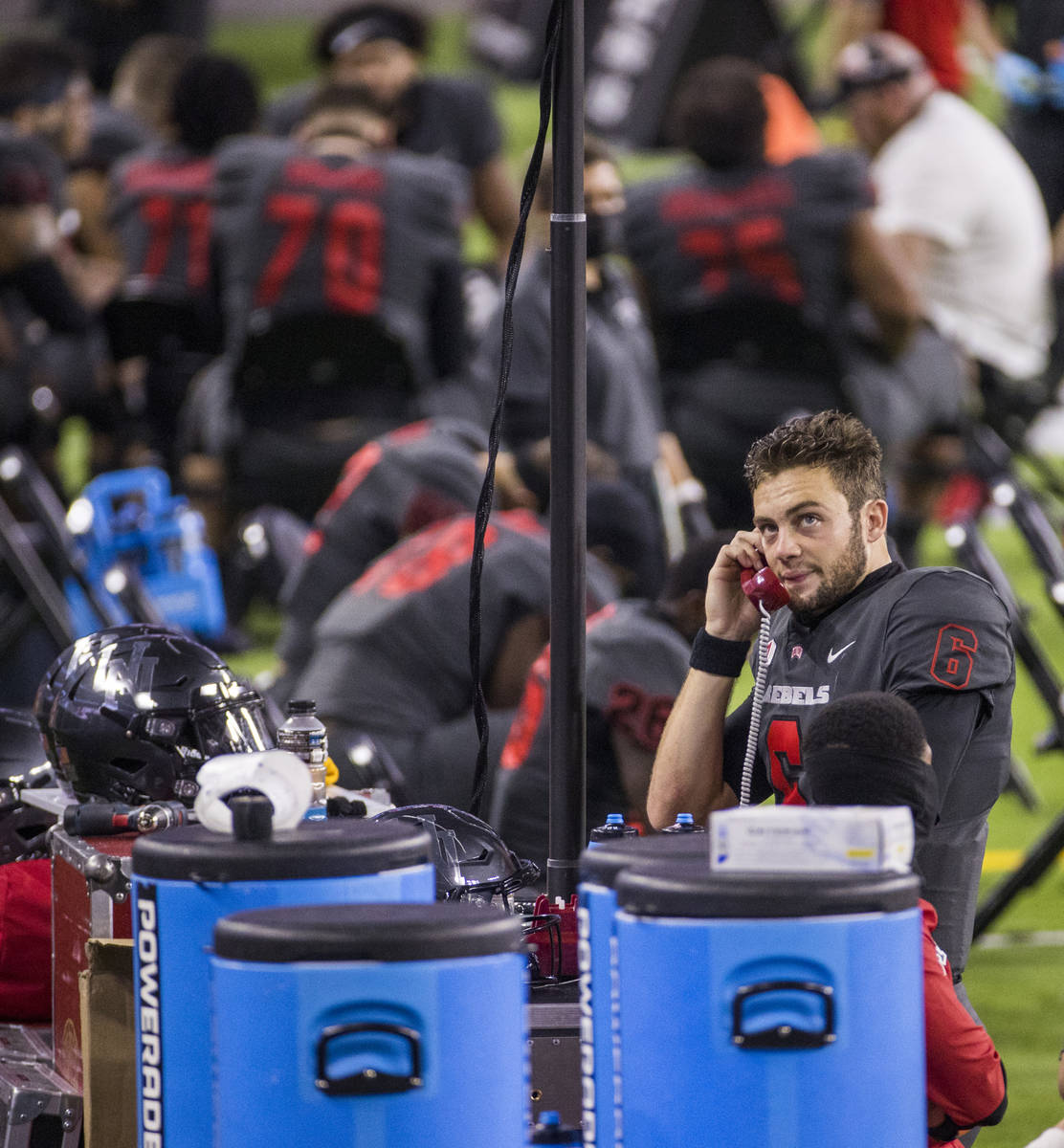 UNLV Rebels quarterback Max Gilliam (6) talks to the coaches upstairs late in their game versus ...