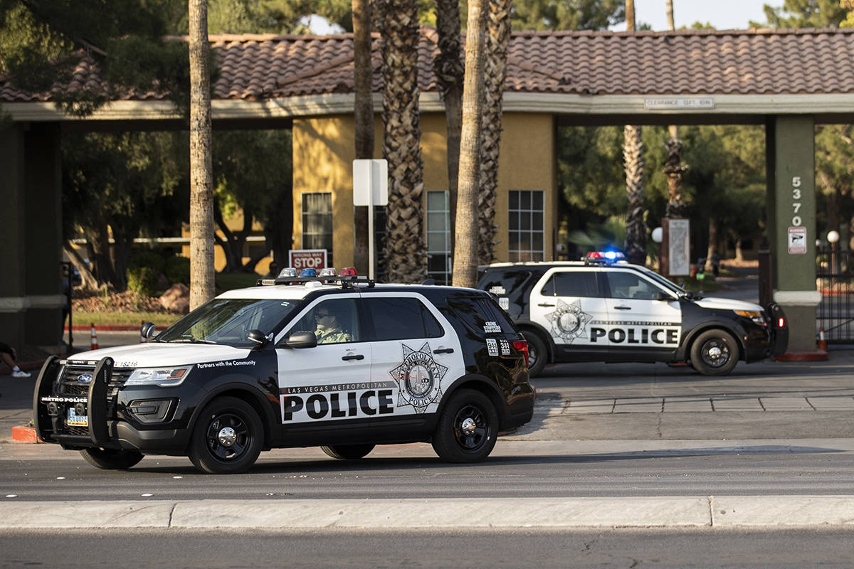 The LVMPD investigate a barricade situation involving a man not allowing a female and child to ...