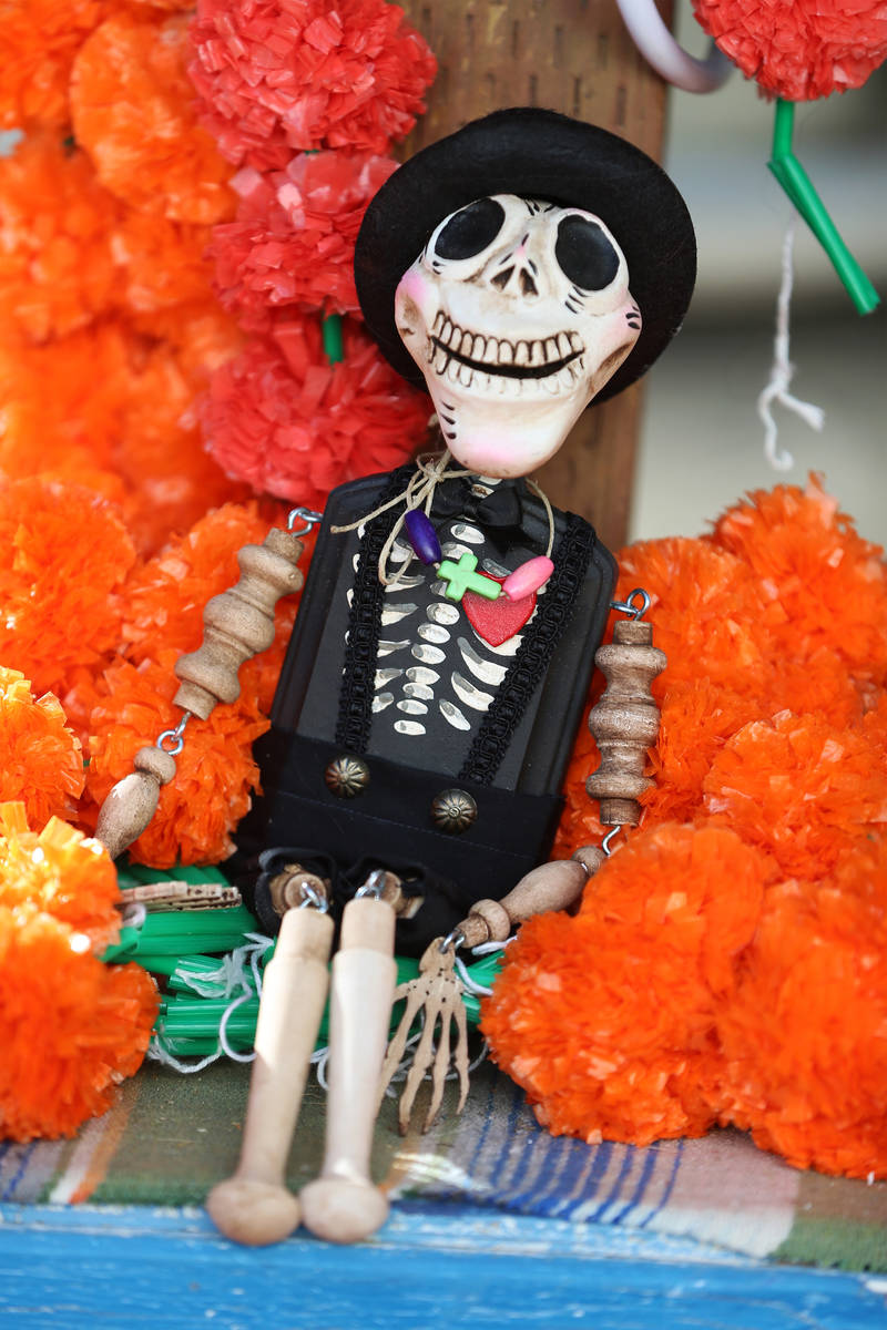 An altar doll created by Isaias Urrabazo that will be part of his Dia de los Muertos altar, at ...