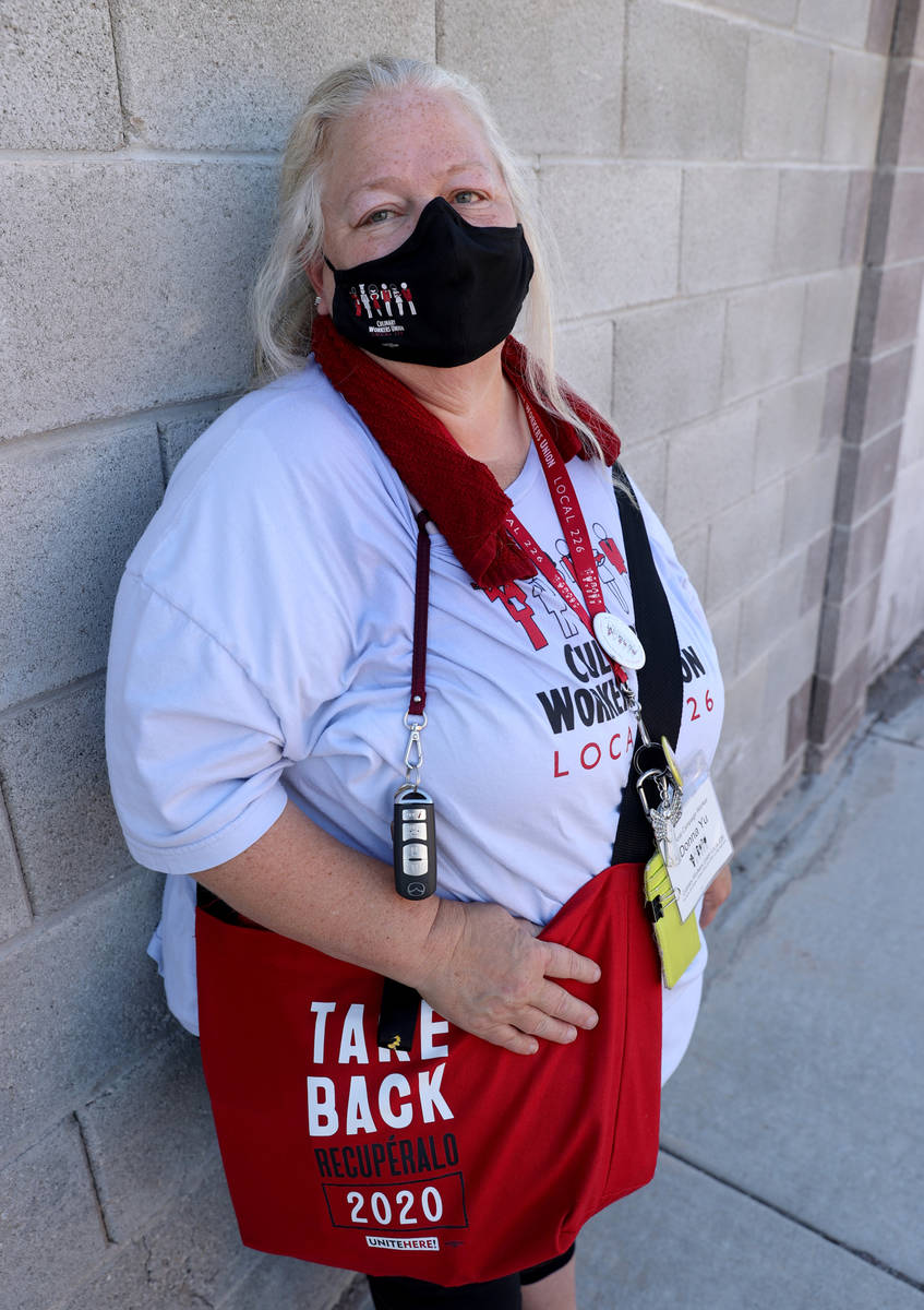 Culinary Union member Donna Kelly-Yu canvasses in North Las Vegas Friday, Oct. 30, 2020. (K.M. ...