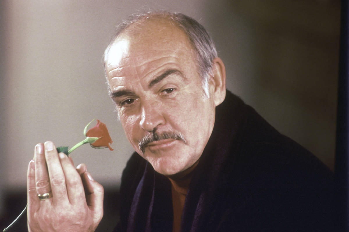 FILE - In this Jan. 23, 1987 file photo, actor Sean Connery holds a rose in his hand as he talk ...