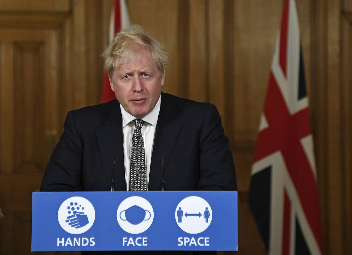 Britain's Prime Minister Boris Johnson speaks during a press conference in 10 Downing Street, L ...