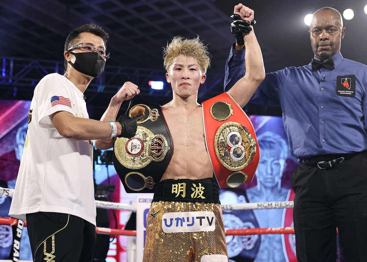 Naoya Inoue celebrates after his knockout victory over Jason Moloney in their bantamweight titl ...