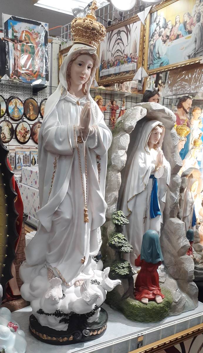 A walk down one aisle at Fantastik can bring widely varied shopping options. These statues are ...