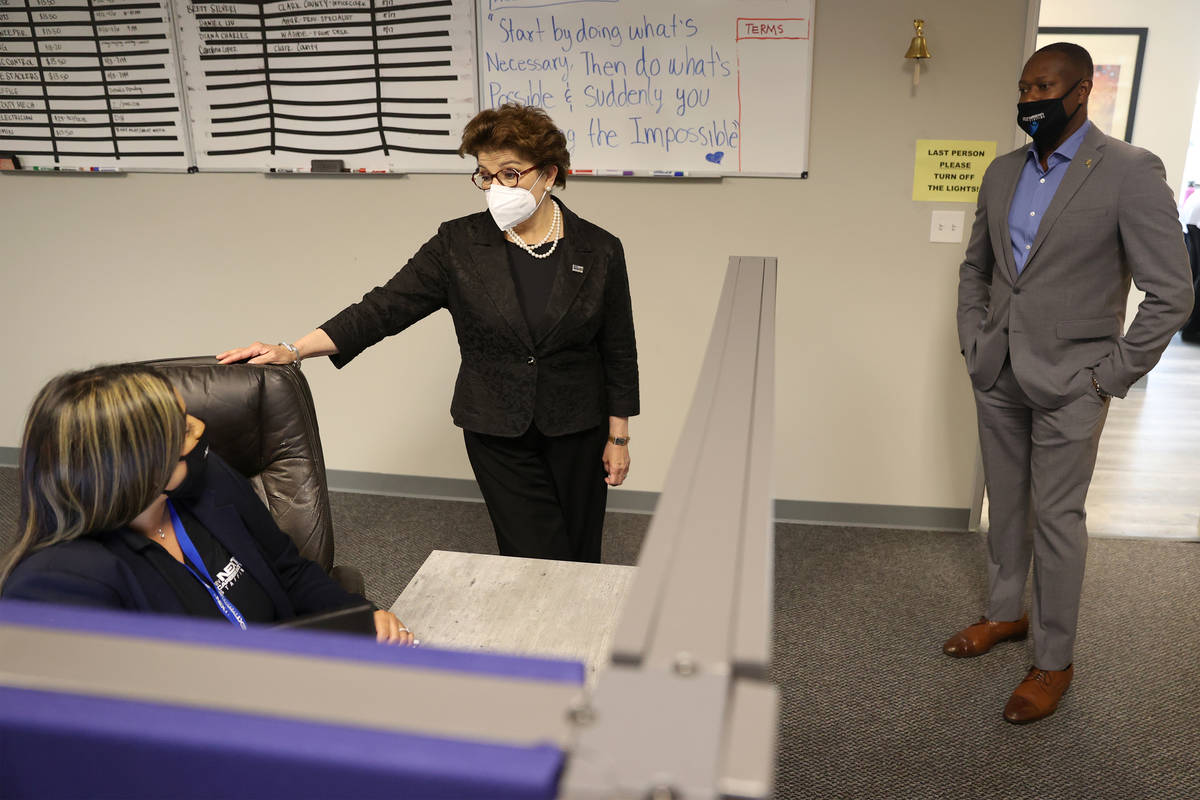 Renee Boyce, right, president of My Next Career Path Staffing, looks on as his recruiting manag ...