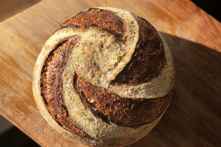 Classic country sourdough is a mixture of American stone ground organic flour, salt and the cou ...