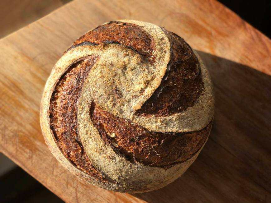 Classic country sourdough is a mixture of American stone ground organic flour, salt and the cou ...