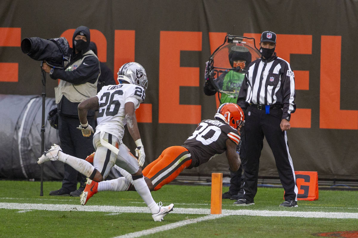 Cleveland Browns wide receiver Jarvis Landry (80) reaches for the end zone after making a catch ...