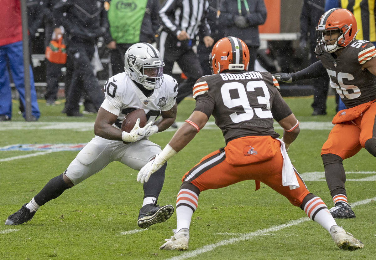 Las Vegas Raiders running back Jalen Richard (30) makes a catch and run against Cleveland Brown ...