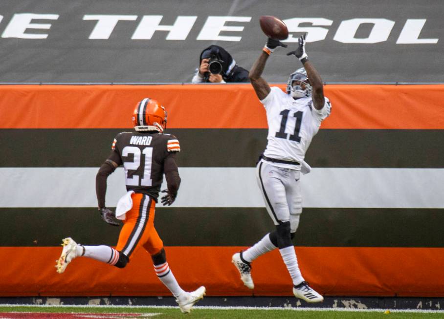 Las Vegas Raiders wide receiver Henry Ruggs III (11) reaches out to try and make a catch agains ...