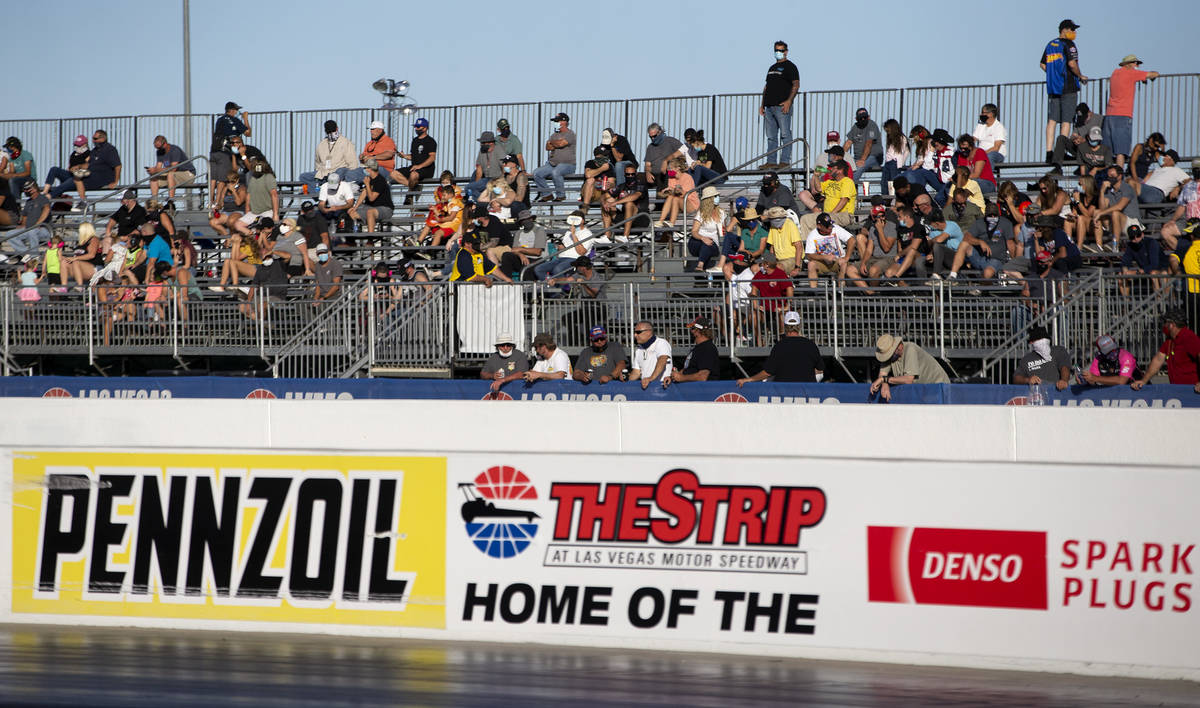 Fans watch as the Dodge NHRA Finals are underway at Las Vegas Motor Speedway on Sunday, Nov. 1, ...