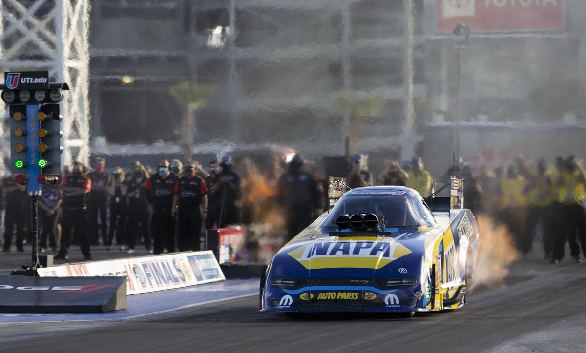 Funny Car driver Ron Capps races during the Dodge NHRA Finals at Las Vegas Motor Speedway on Su ...