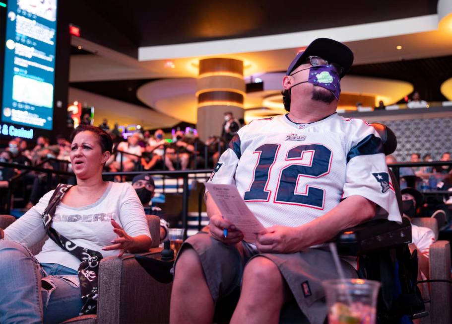 Jesus “Chuy” Baca, right, watches NFL Sunday at the new sportsbook at Circa in Las Vegas, S ...