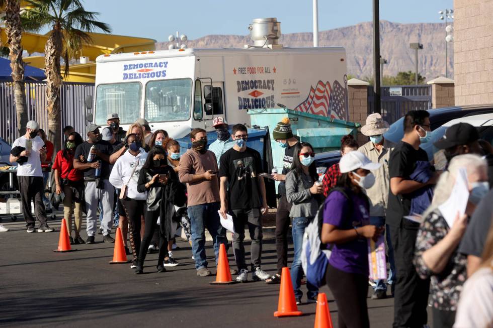 People line up to vote at Desert Breeze Community Center in Las Vegas on Election Day Tuesday, ...