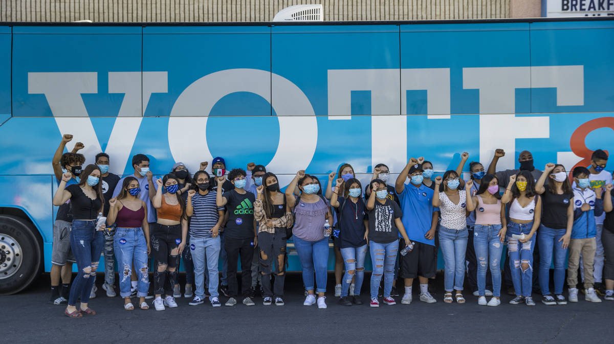 Youth campaign volunteers gather before setting out to canvass area neighborhoods following an ...