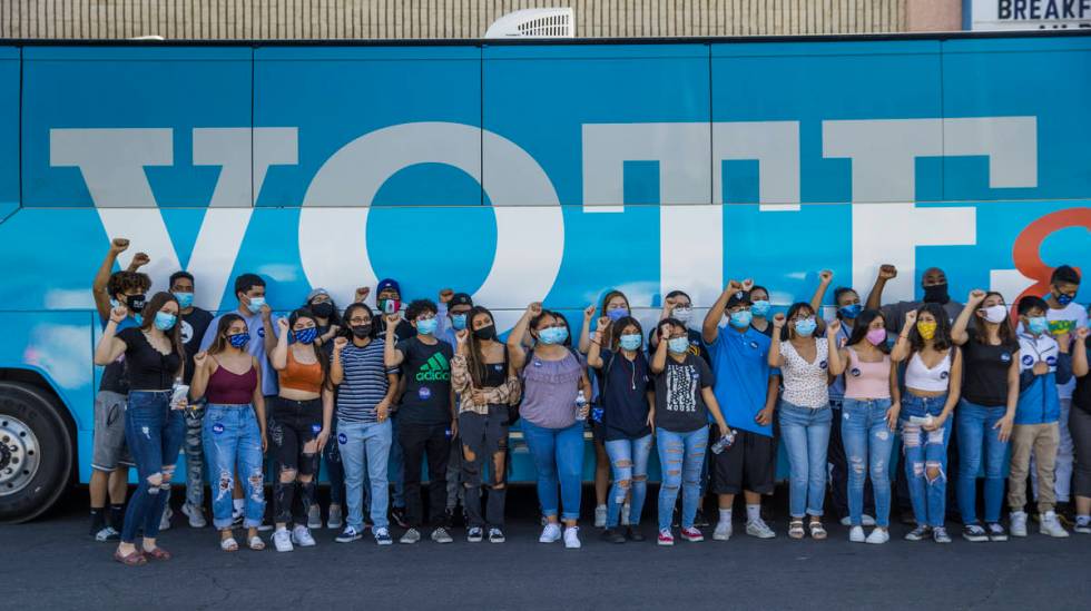 Youth campaign volunteers gather before setting out to canvass area neighborhoods following an ...