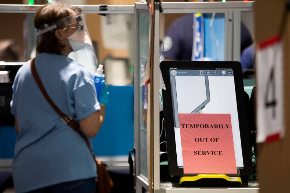 One voting terminal is out of order at the Las Vegas Ballpark voting site on Election Day, Tues ...