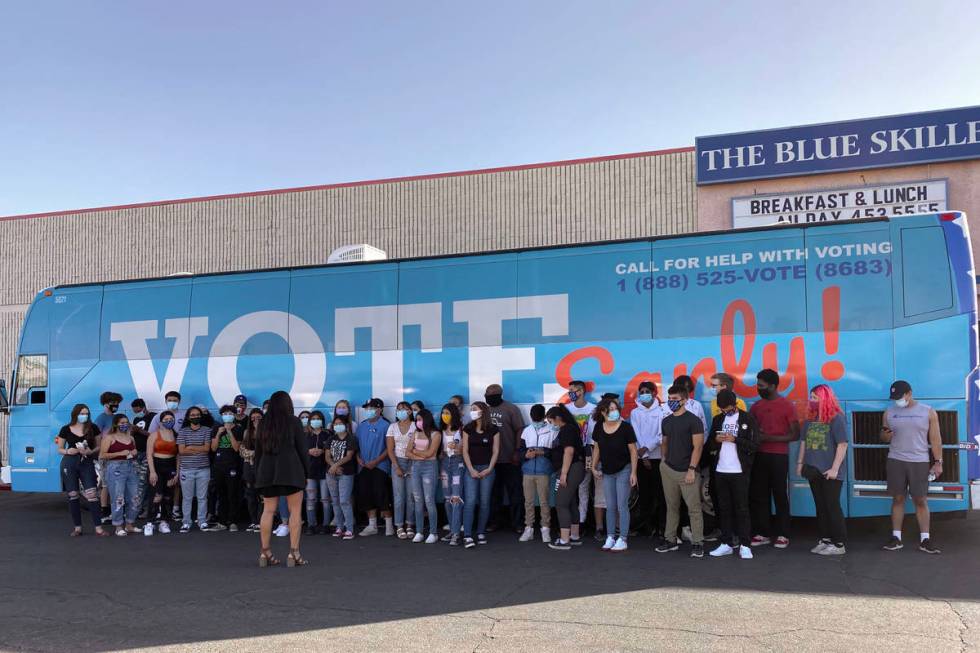 Youth volunteer canvassers gather before fanning out into the nearby neighborhoods following th ...