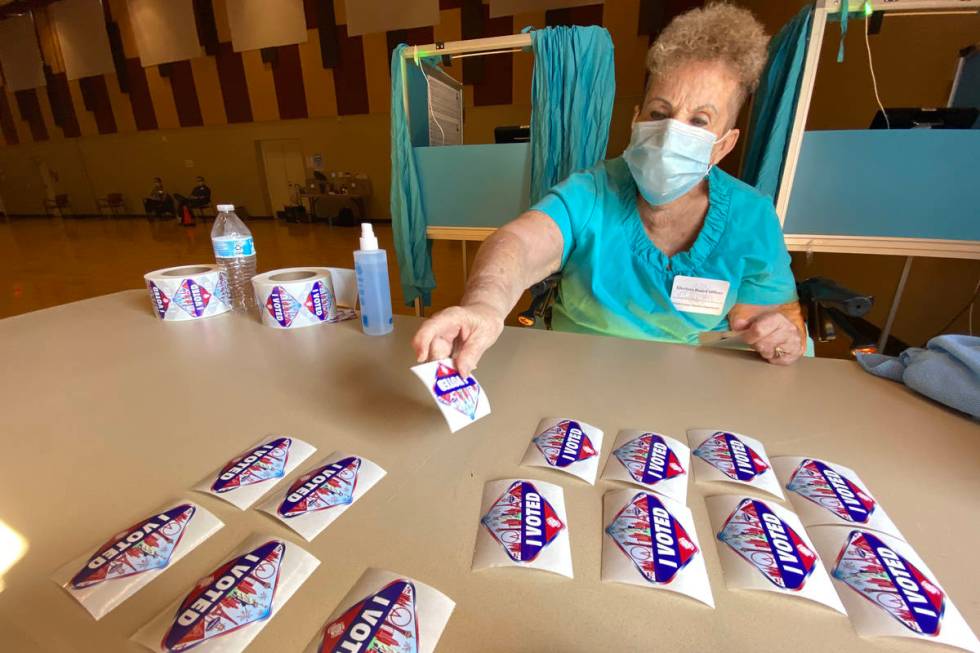 Connie Marshall, 77, prepares to pass out “I Voted” stickers at Historic Fifth St ...