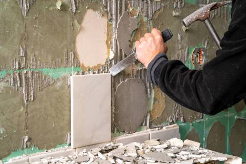 The best way to separate the tile from the drywall is to use a putty knife or other suitable fl ...