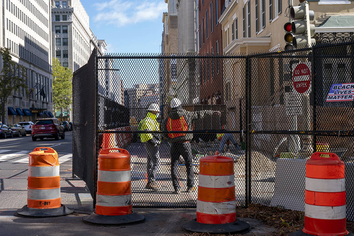 Anti-scaling fence is set up at an entrance to Lafayette Park, Monday, Nov. 2, 2020, near the W ...
