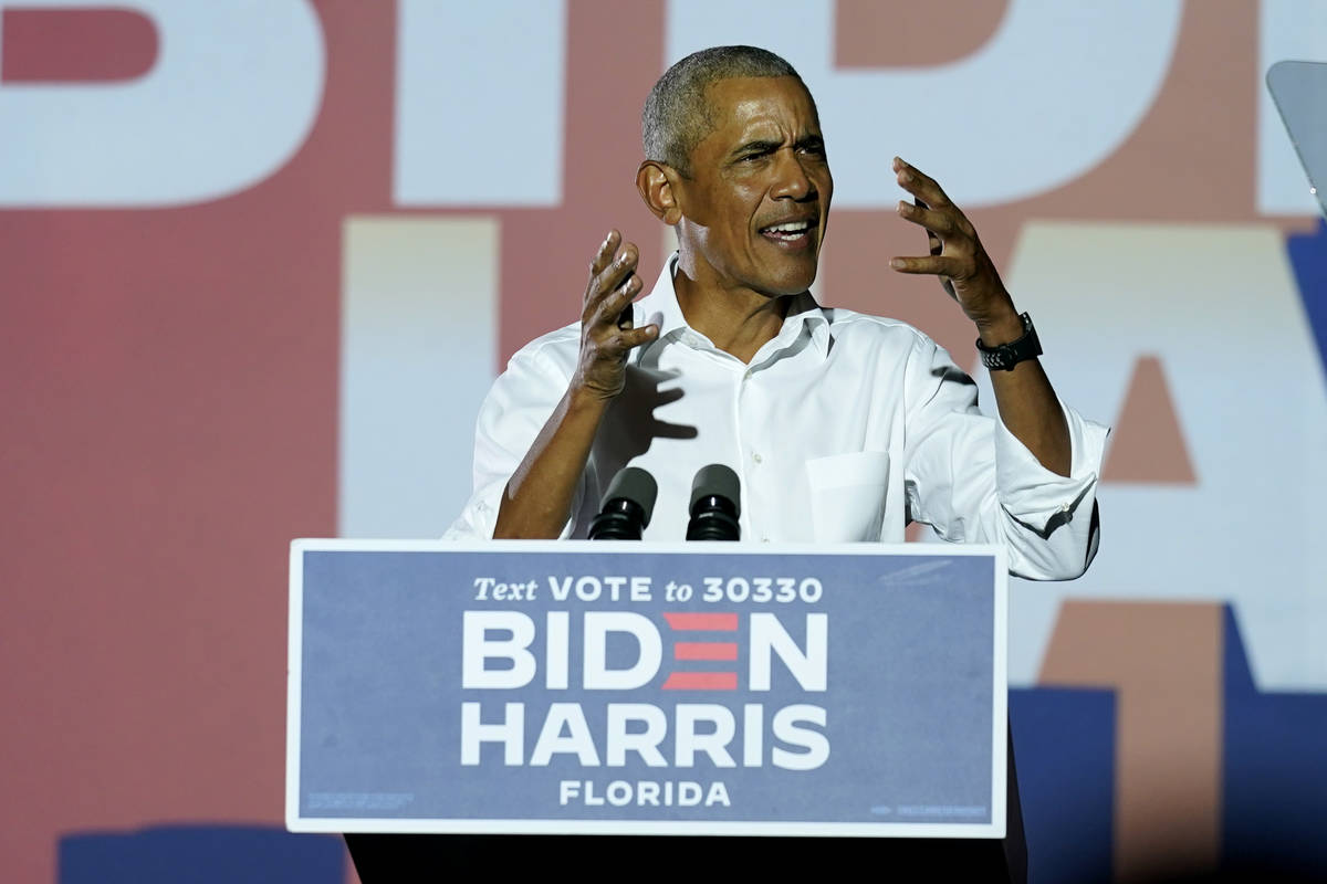 Former President Barack Obama speaks at a rally as he campaigns for Democratic presidential can ...