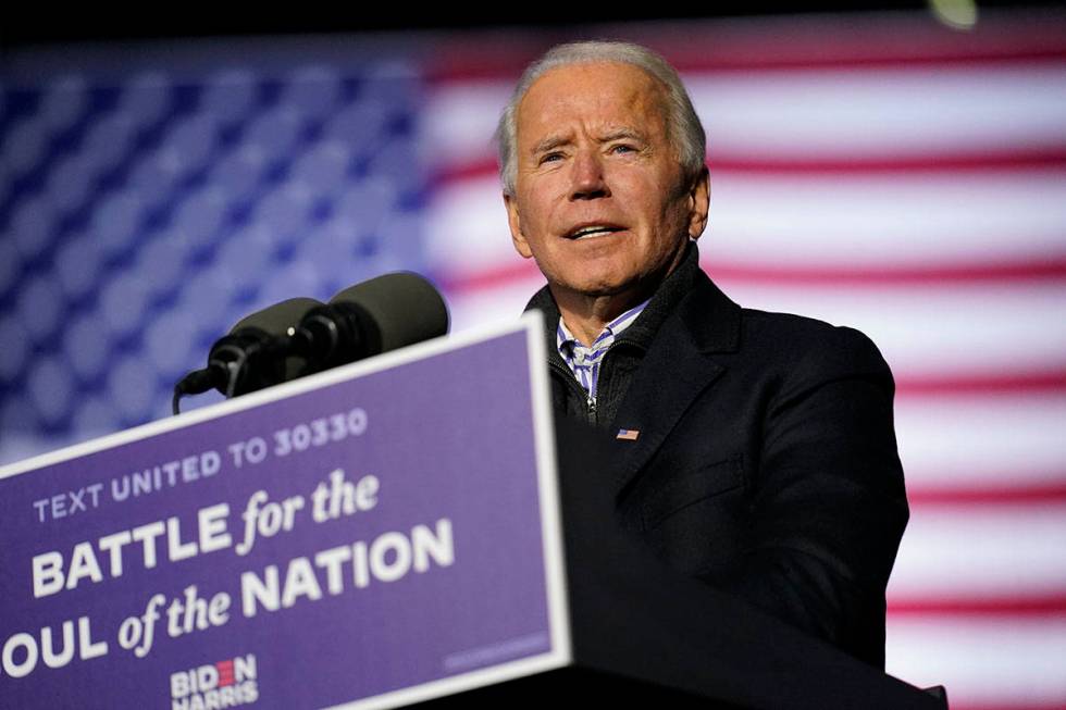 Democratic presidential candidate former Vice President Joe Biden speaks during a drive-in rall ...