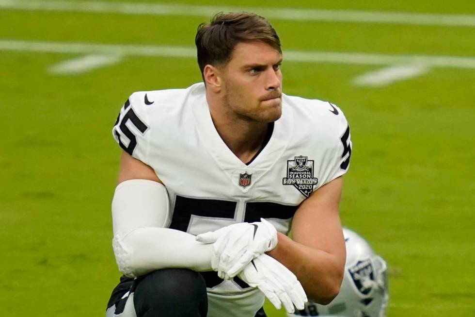 Las Vegas Raiders linebacker Tanner Muse (55) stretches during an NFL football training camp pr ...