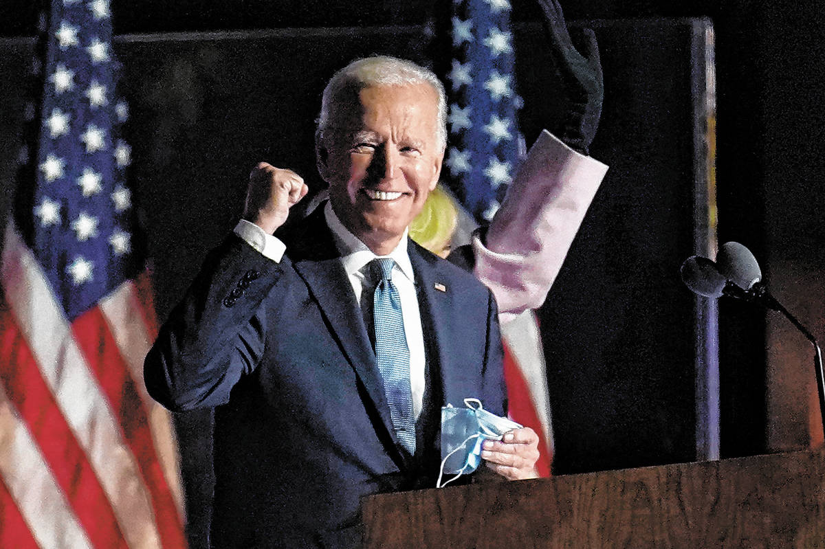 Democratic presidential candidate former Vice President Joe Biden speaks to supporters, early W ...