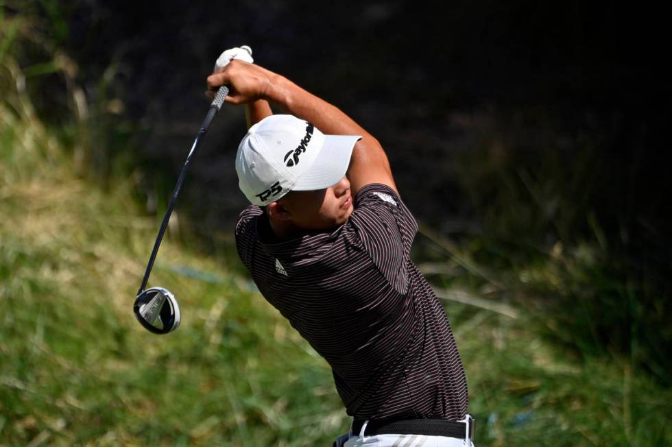 Collin Morikawa swings away during the final round of the CJ Cup golf tournament at Shadow Cree ...