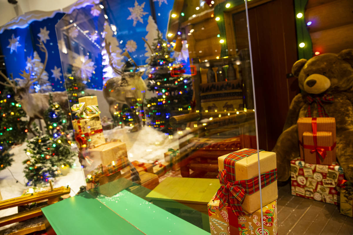 An acrylic panel is seen at the space for photos with Santa Claus in Santa's Wonderland space a ...